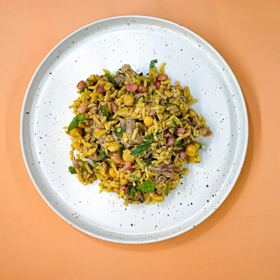 Lamb Pilaf served with pomegranate and mint – a Middle Eastern-inspired dish designed for early eaters